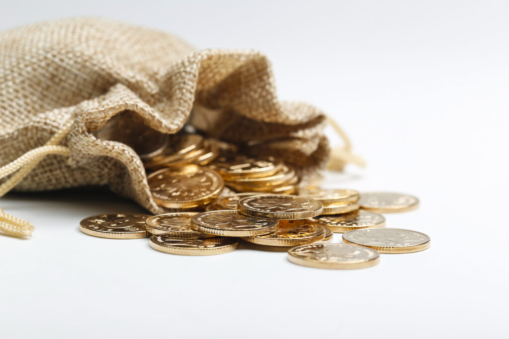 Golden rmb coins in cloth bag
